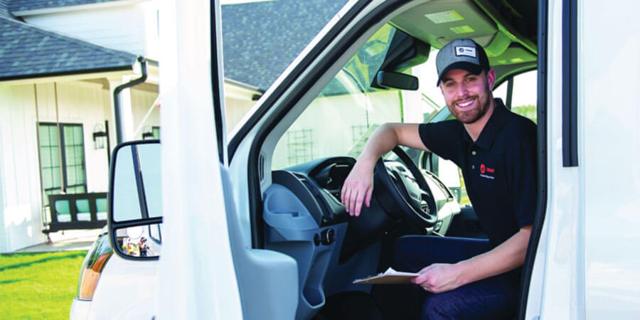 Service technician in service truck